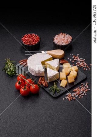 White French cream cheese Brie or Camembert for breakfast. Brie or Camembert cheese White French cream cheese Brie or Camembert for breakfast. Brie or Camembert cheese 136968729