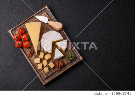 White French cream cheese Brie or Camembert for breakfast. Brie or Camembert cheese White French cream cheese Brie or Camembert for breakfast. Brie or Camembert cheese 136968743