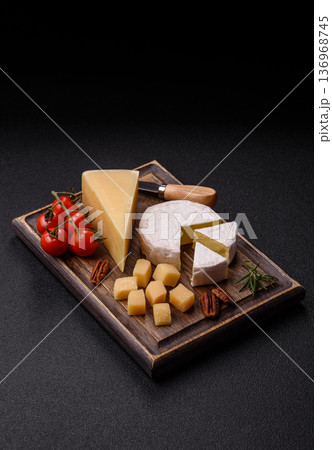 White French cream cheese Brie or Camembert for breakfast. Brie or Camembert cheese 136968745