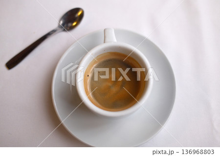 Hot Coffee Cup on Table with Natural Light Hot Coffee Cup on Table with Natural Light 136968803