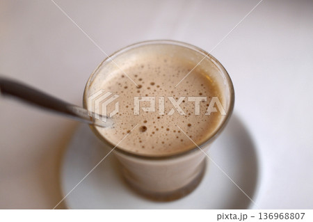 Hot Coffee Cup on Table with Natural Light 136968807