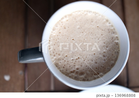 Hot Coffee Cup on Table with Natural Light 136968808