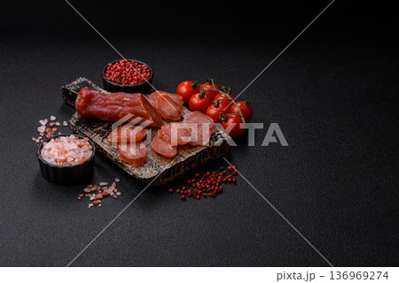 Sliced smoked dry sausage made from turkey or pork for sandwiches. Sliced smoked sausage Sliced smoked dry sausage made from turkey or pork for sandwiches. Sliced smoked sausage 136969274