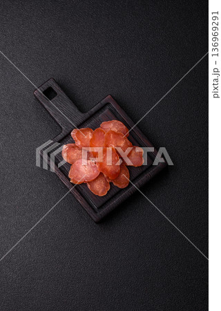 Sliced smoked dry sausage made from turkey or pork for sandwiches. Sliced smoked sausage Sliced smoked dry sausage made from turkey or pork for sandwiches. Sliced smoked sausage 136969291