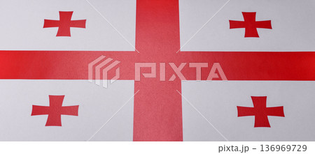 Georgia, the Georgian red and white flag as a symbol of independence and freedom. The Georgian flag Georgia, the Georgian red and white flag as a symbol of independence and freedom. The Georgian flag 136969729