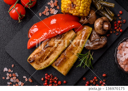 Vegetables. corn, bell peppers, zucchini, and mushrooms grilled or barbecued. Grilled vegetables Vegetables. corn, bell peppers, zucchini, and mushrooms grilled or barbecued. Grilled vegetables 136970175