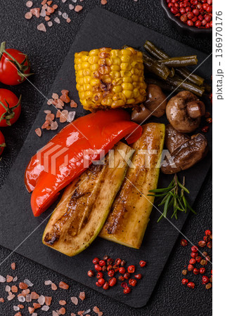 Vegetables. corn, bell peppers, zucchini, and mushrooms grilled or barbecued. Grilled vegetables Vegetables. corn, bell peppers, zucchini, and mushrooms grilled or barbecued. Grilled vegetables 136970176