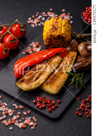 Vegetables. corn, bell peppers, zucchini, and mushrooms grilled or barbecued. Grilled vegetables Vegetables. corn, bell peppers, zucchini, and mushrooms grilled or barbecued. Grilled vegetables 136970177