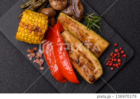 Vegetables. corn, bell peppers, zucchini, and mushrooms grilled or barbecued. Grilled vegetables Vegetables. corn, bell peppers, zucchini, and mushrooms grilled or barbecued. Grilled vegetables 136970179