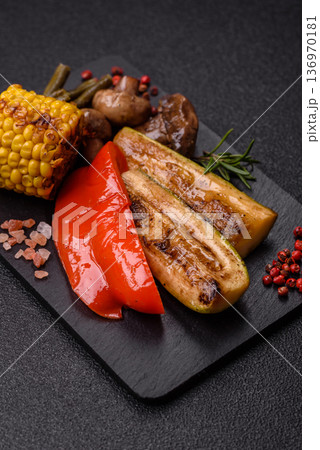 Vegetables. corn, bell peppers, zucchini, and mushrooms grilled or barbecued. Grilled vegetables Vegetables. corn, bell peppers, zucchini, and mushrooms grilled or barbecued. Grilled vegetables 136970181
