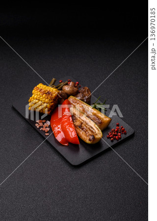 Vegetables. corn, bell peppers, zucchini, and mushrooms grilled or barbecued. Grilled vegetables 136970185