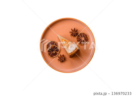 Cheesecake, a slice of sweet pie, a classic cheese dessert. Cheesecake as a food background Cheesecake, a slice of sweet pie, a classic cheese dessert. Cheesecake as a food background 136970233