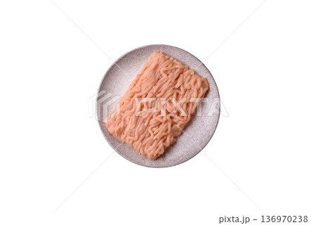 Raw ground chicken for burgers and other food. Raw minced chicken meat 136970238