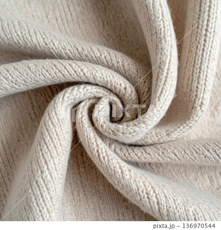 Swirling Beige Knitted Wool Fabric Close Up Detailed Pattern and Soft Texture Swirling Beige Knitted Wool Fabric Close Up Detailed Pattern and Soft Texture 136970544