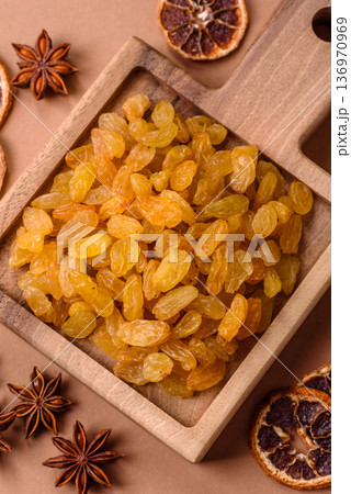 Sweet, dry, golden or yellow raisin made from grapes are a healthy, nutritious food. Golden raisins Sweet, dry, golden or yellow raisin made from grapes are a healthy, nutritious food. Golden raisins 136970969