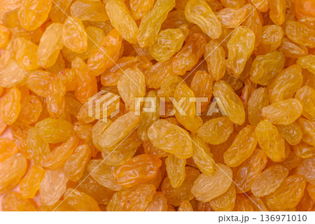 Sweet, dry, golden or yellow raisin made from grapes are a healthy, nutritious food. Golden raisins Sweet, dry, golden or yellow raisin made from grapes are a healthy, nutritious food. Golden raisins 136971010