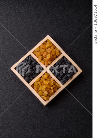 Sweet, dry, golden or yellow raisin made from grapes are a healthy, nutritious food. Golden raisins Sweet, dry, golden or yellow raisin made from grapes are a healthy, nutritious food. Golden raisins 136971014