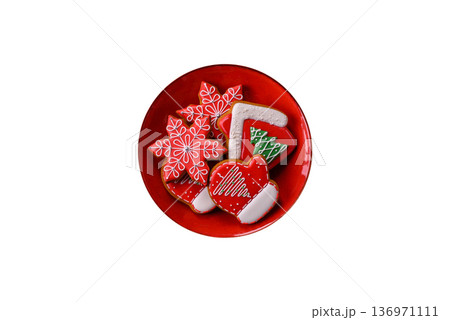 Gingerbread, Christmas cookies, or sweets for a festive family table. Christmas gingerbread Gingerbread, Christmas cookies, or sweets for a festive family table. Christmas gingerbread 136971111