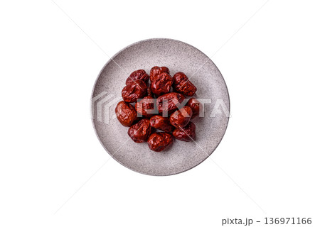 Red dried dates, the Chinese sweet fruit jujube, as a healthy food. Red dates, jujube Red dried dates, the Chinese sweet fruit jujube, as a healthy food. Red dates, jujube 136971166