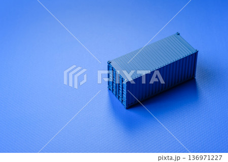 A cargo container in a port warehouse as a logistics element, export. A cargo container A cargo container in a port warehouse as a logistics element, export. A cargo container 136971227