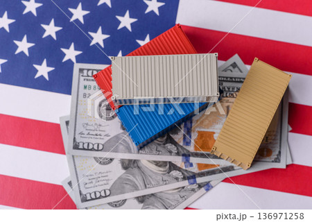 Cargo containers on the US flag as a conceptual backdrop for goods export and logistics. Cargo containers 136971258