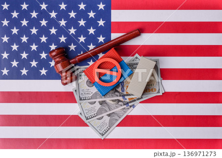 The cargo container ban on the US flag as a conceptual backdrop. The cargo container embargo 136971273