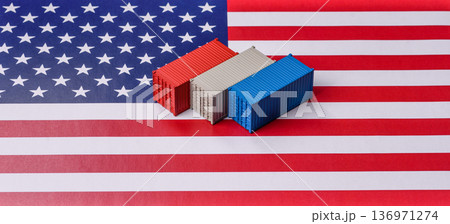 Cargo containers on the US flag as a conceptual backdrop for goods export and logistics. Cargo containers 136971274