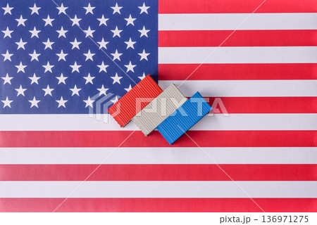 Cargo containers on the US flag as a conceptual backdrop for goods export and logistics. Cargo containers Cargo containers on the US flag as a conceptual backdrop for goods export and logistics. Cargo containers 136971275