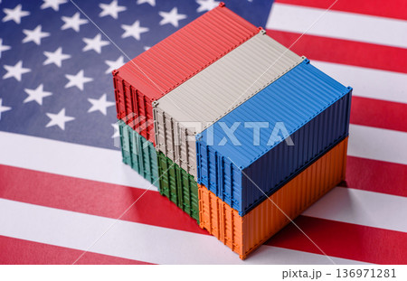 Cargo containers on the US flag as a conceptual backdrop for goods export and logistics. Cargo containers 136971281