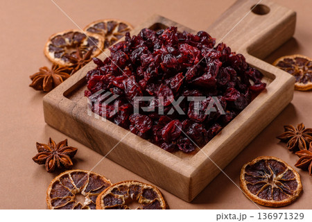 Dried sweet cranberries, natural berries for a healthy diet. Dried cranberries Dried sweet cranberries, natural berries for a healthy diet. Dried cranberries 136971329