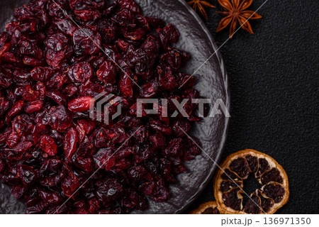 Dried sweet cranberries, natural berries for a healthy diet. Dried cranberries Dried sweet cranberries, natural berries for a healthy diet. Dried cranberries 136971350