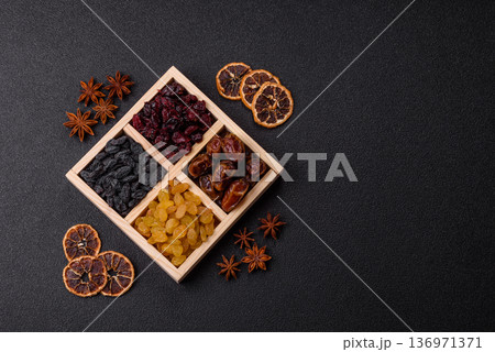 Dried fruits and berries, cranberries, dates, and raisins for a healthy diet. Dried berries and fruits 136971371