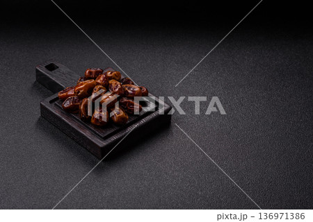 Dried sweet dates, natural tropical fruits for a healthy diet. Dried dates 136971386