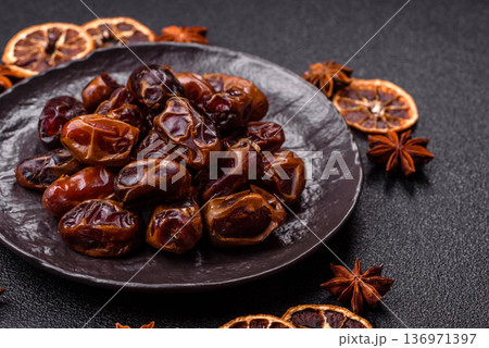 Dried sweet dates, natural tropical fruits for a healthy diet. Dried dates 136971397