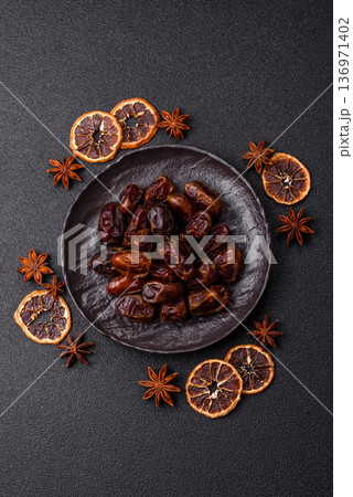 Dried sweet dates, natural tropical fruits for a healthy diet. Dried dates 136971402