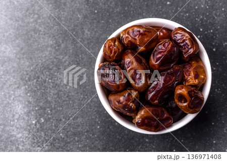 Dried sweet dates, natural tropical fruits for a healthy diet. Dried dates 136971408