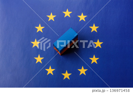 Cargo containers on the EU flag as a conceptual backdrop. Cargo containers on the EU flag Cargo containers on the EU flag as a conceptual backdrop. Cargo containers on the EU flag 136971458