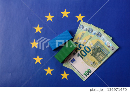 Cargo containers on the EU flag as a conceptual backdrop. Cargo containers on the EU flag Cargo containers on the EU flag as a conceptual backdrop. Cargo containers on the EU flag 136971470