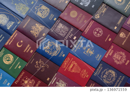 Passports of citizens of different countries of the world. Passports background 136971559