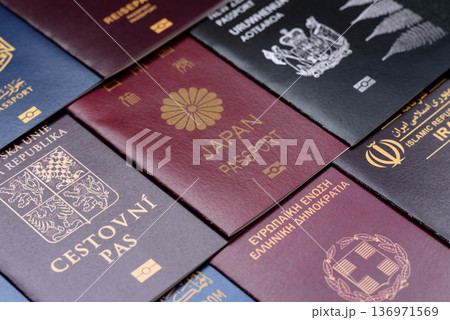 Passports of citizens of different countries of the world. Passports background 136971569