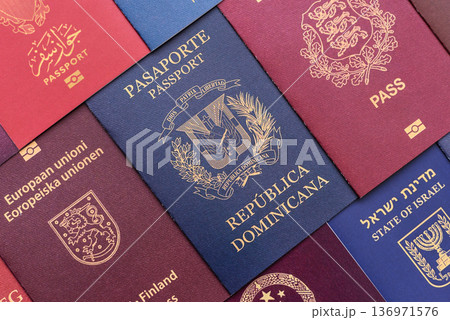 Passports of citizens of different countries of the world. Passports background 136971576