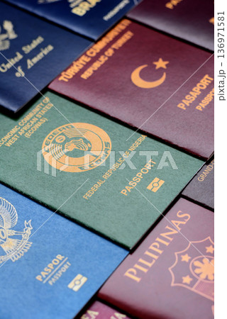 Passports of citizens of different countries of the world. Passports background 136971581