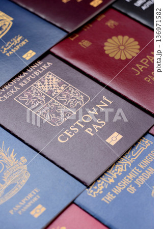 Passports of citizens of different countries of the world. Passports background Passports of citizens of different countries of the world. Passports background 136971582