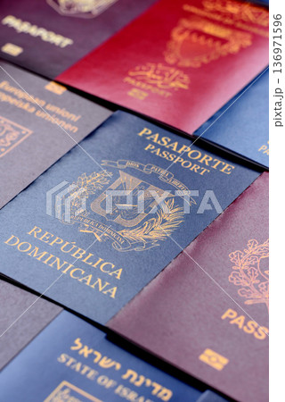 Passports of citizens of different countries of the world. Passports background Passports of citizens of different countries of the world. Passports background 136971596