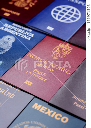 Passports of citizens of different countries of the world. Passports background Passports of citizens of different countries of the world. Passports background 136971598