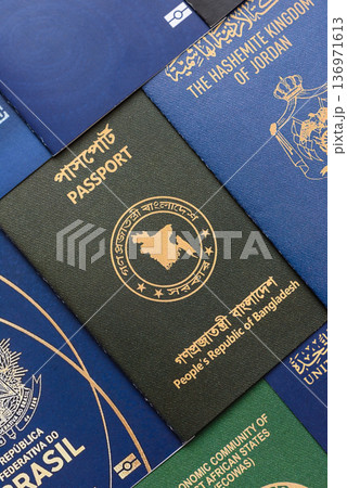 Passports of citizens of different countries of the world. Passports background Passports of citizens of different countries of the world. Passports background 136971613