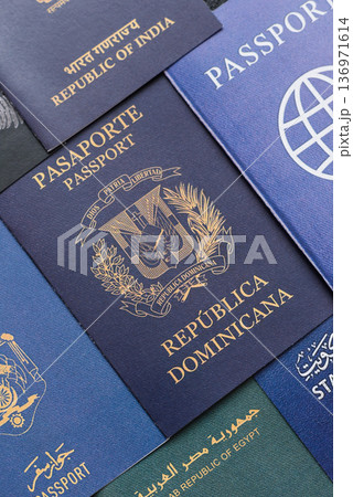 Passports of citizens of different countries of the world. Passports background Passports of citizens of different countries of the world. Passports background 136971614