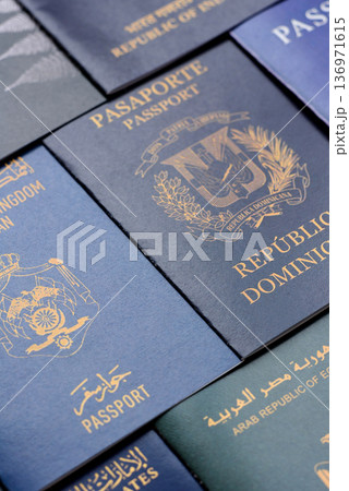 Passports of citizens of different countries of the world. Passports background Passports of citizens of different countries of the world. Passports background 136971615