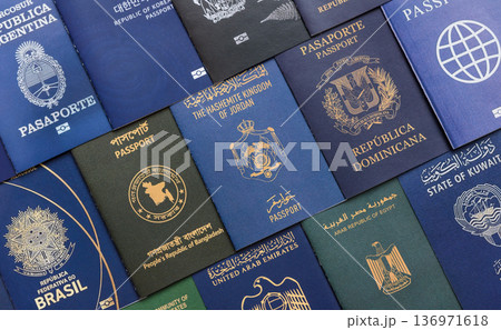 Passports of citizens of different countries of the world. Passports background 136971618