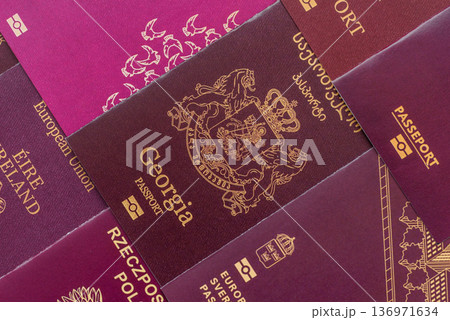 Passports of citizens of different countries of the world. Passports background 136971634